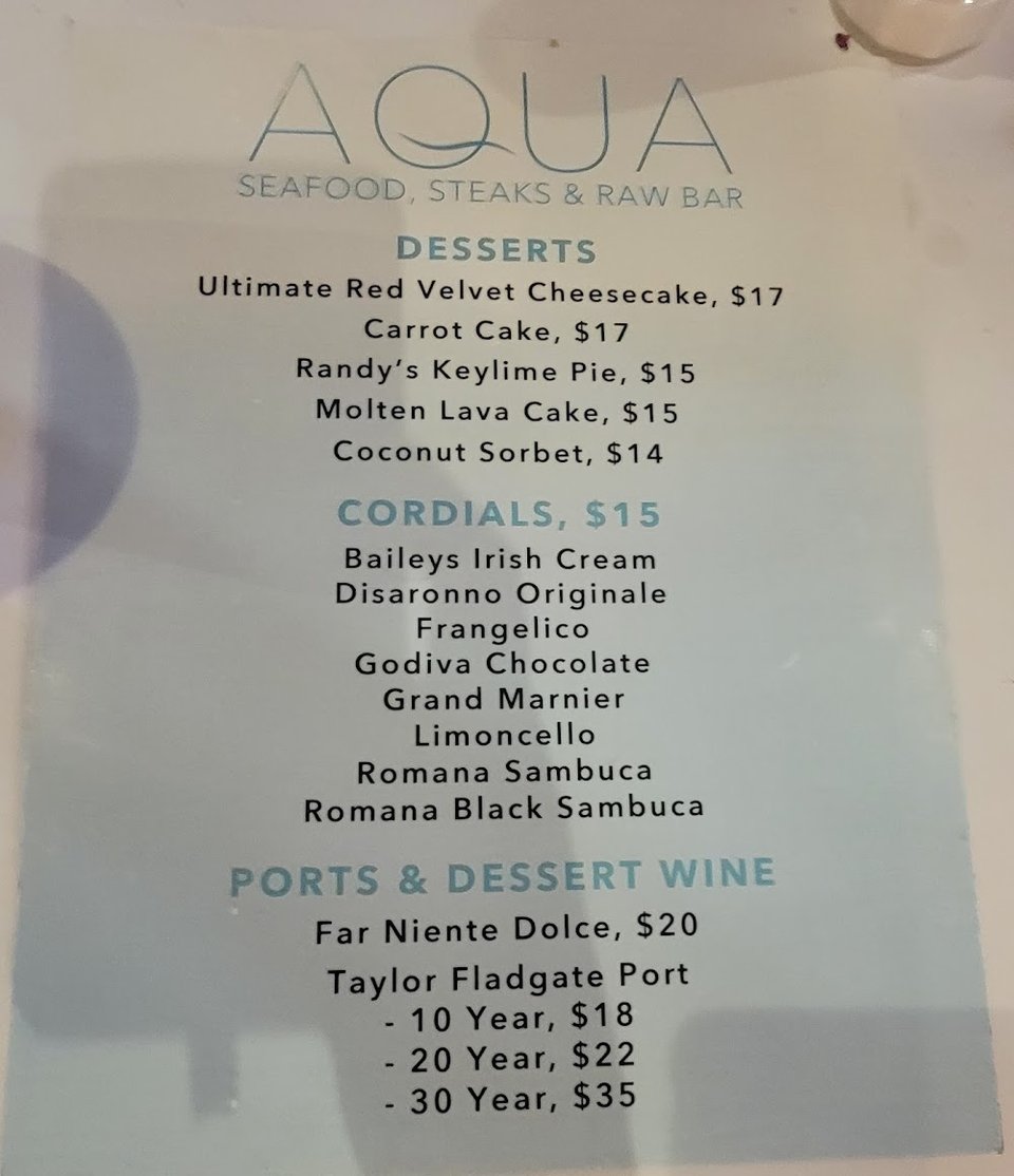 Wine and cocktail list beside dinner selections.